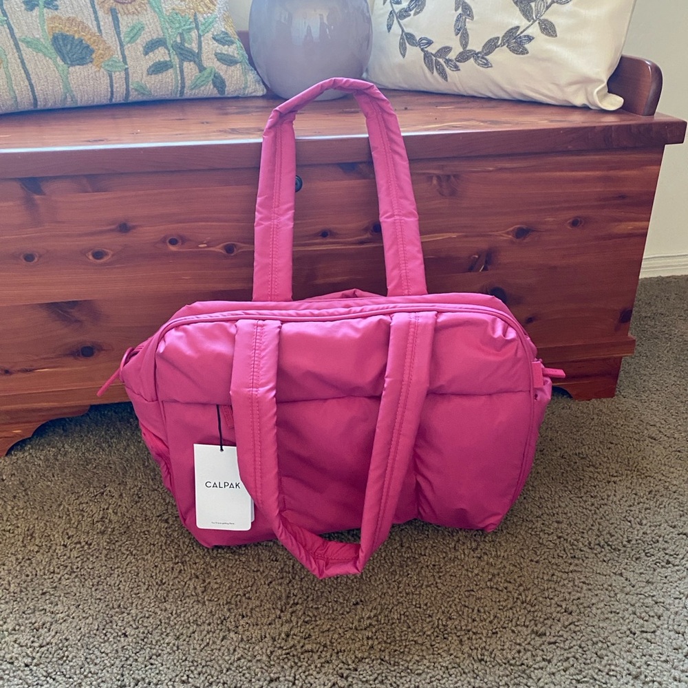 Calpak luka duffel bag in dragonfruit